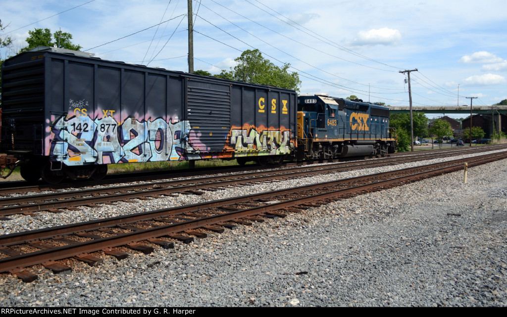 Going away shot of CSX local L20606 as it heads east on the "switching lead" to Sandy Hook Yard.